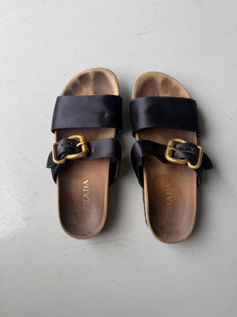 Prada Black Leather Slide Sandals with Gold Buckles